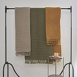 Плед из шерсти зеленого цвета с бахромой Waffle Comfort варинант исполнения - 4 | Loft Concept в Ижевске