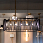 Люстра подвесная овальной формы с металлическим решетчатым абажуром матово-черного цвета и 5 лампами Kichler варинант исполнения - 7 | Loft Concept в Ижевске