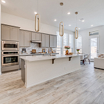 Подвесной светильник золотого цвета с двумя вытянутыми овальными рамками в форме скрепки Eurofase варинант исполнения - 7 | Loft Concept в Ижевске